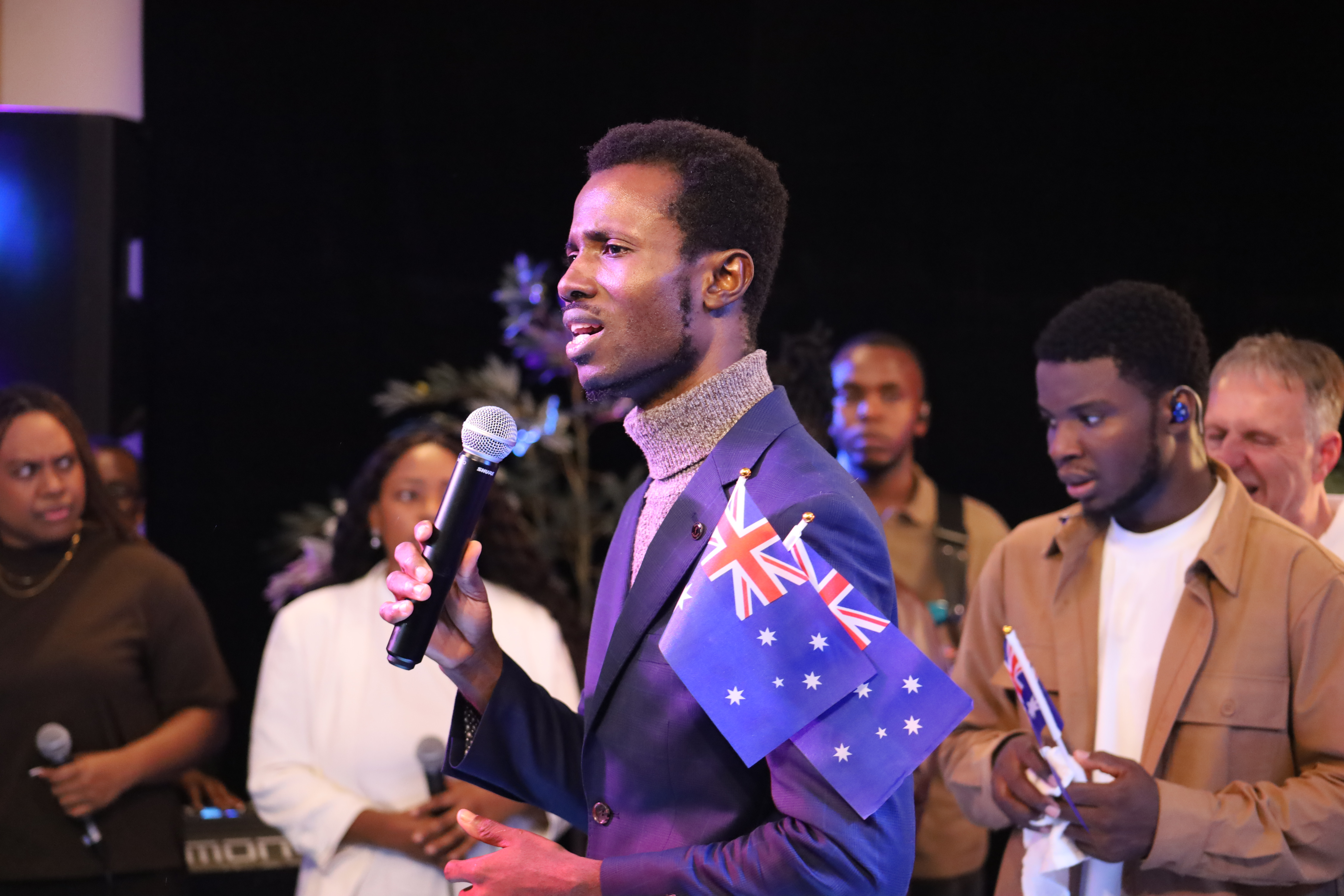 Members of the Keep The Faith global family worshipping together